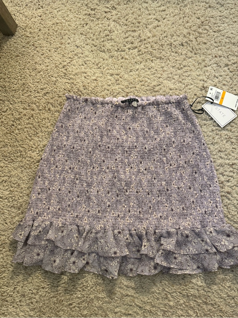 1. State Lavender Floral Smocked Ruffle Mini Skirt